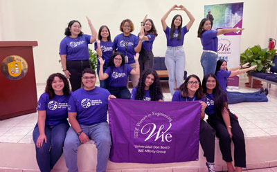 IEEE WIE Affinity group standing behind IEEE WIE banner. IEEE WIE Affinity group standing behind IEEE WIE banner.