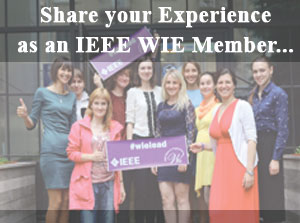 IEEE WIE members holding an #wielead banner. 